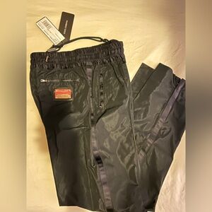 Authentic Dolce & Gabbana tuxedo silk trousers, brand new with tags. 2009